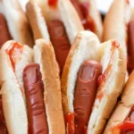 Spooky Halloween hot dog fingers artfully arranged