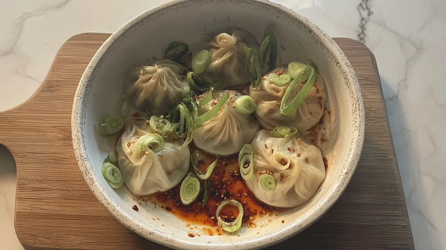 Soup Dumplings: The 3 Best Ways to Eat Them 1 Deliciously prepared soup dumplings with delicate pleats