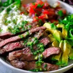 Grilled cilantro lime steak, showcasing a tender cut of meat with fresh herbs.