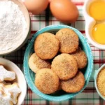Closeup of secret recipe sugar cookies, lightly dusted with fine sugar.