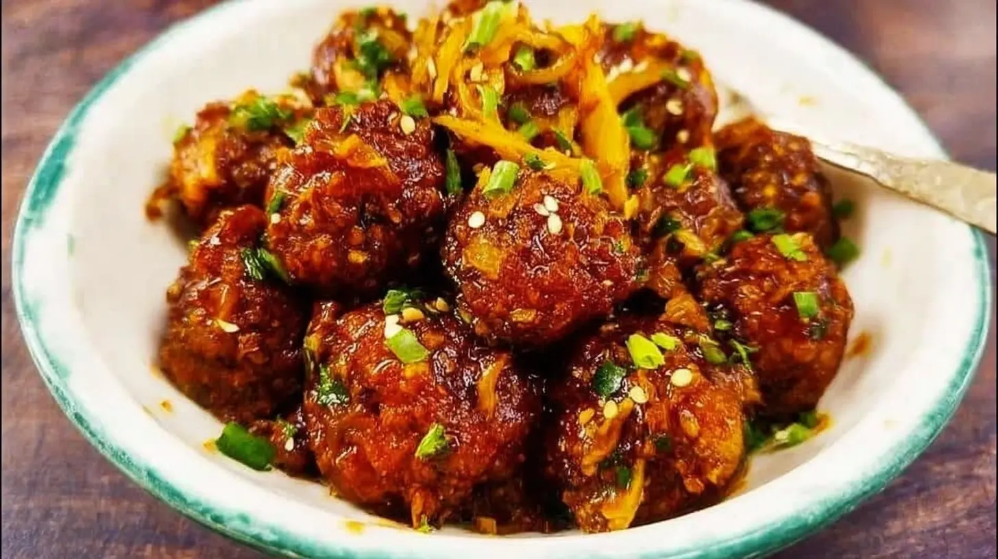 Cabbage Manchurian: 4 Ways to Serve This Treat 2 A close-up of delicious Cabbage Manchurian garnished with spring onions