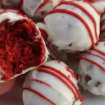Bite-sized cheesecake truffles arranged artfully, ready to be enjoyed.
