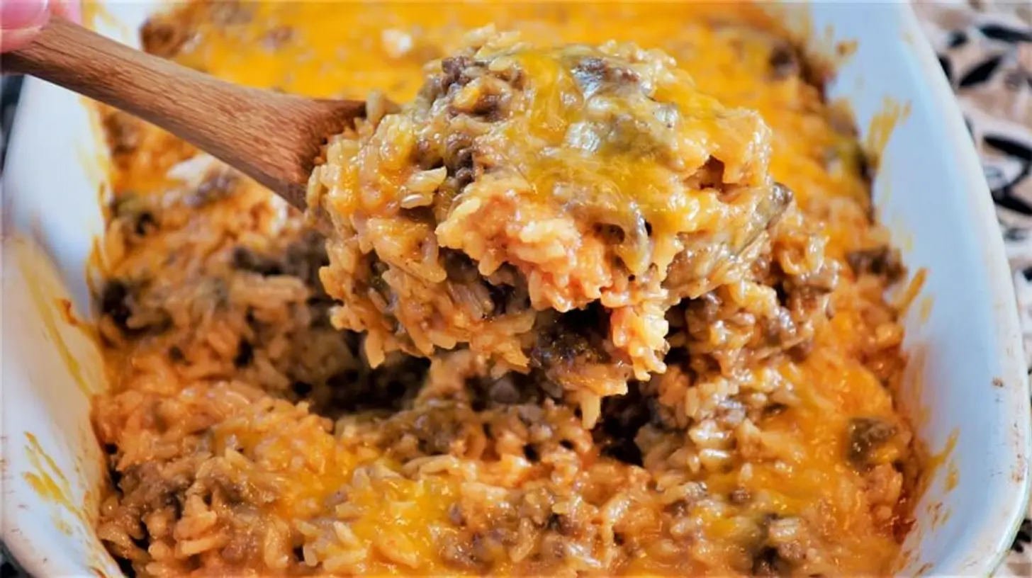 A bubbling cheesy hamburger rice casserole, fresh from the oven