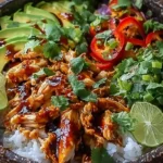 Overhead shot of a Honey Chipotle Chicken Bowl with colorful ingredients