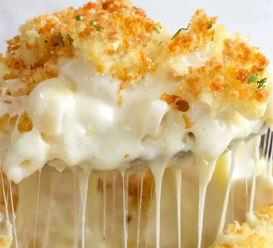 Baked Mac and Cheese: 7 Ways to Level Up Your Meal 2 A bubbling dish of baked mac and cheese fresh from the oven