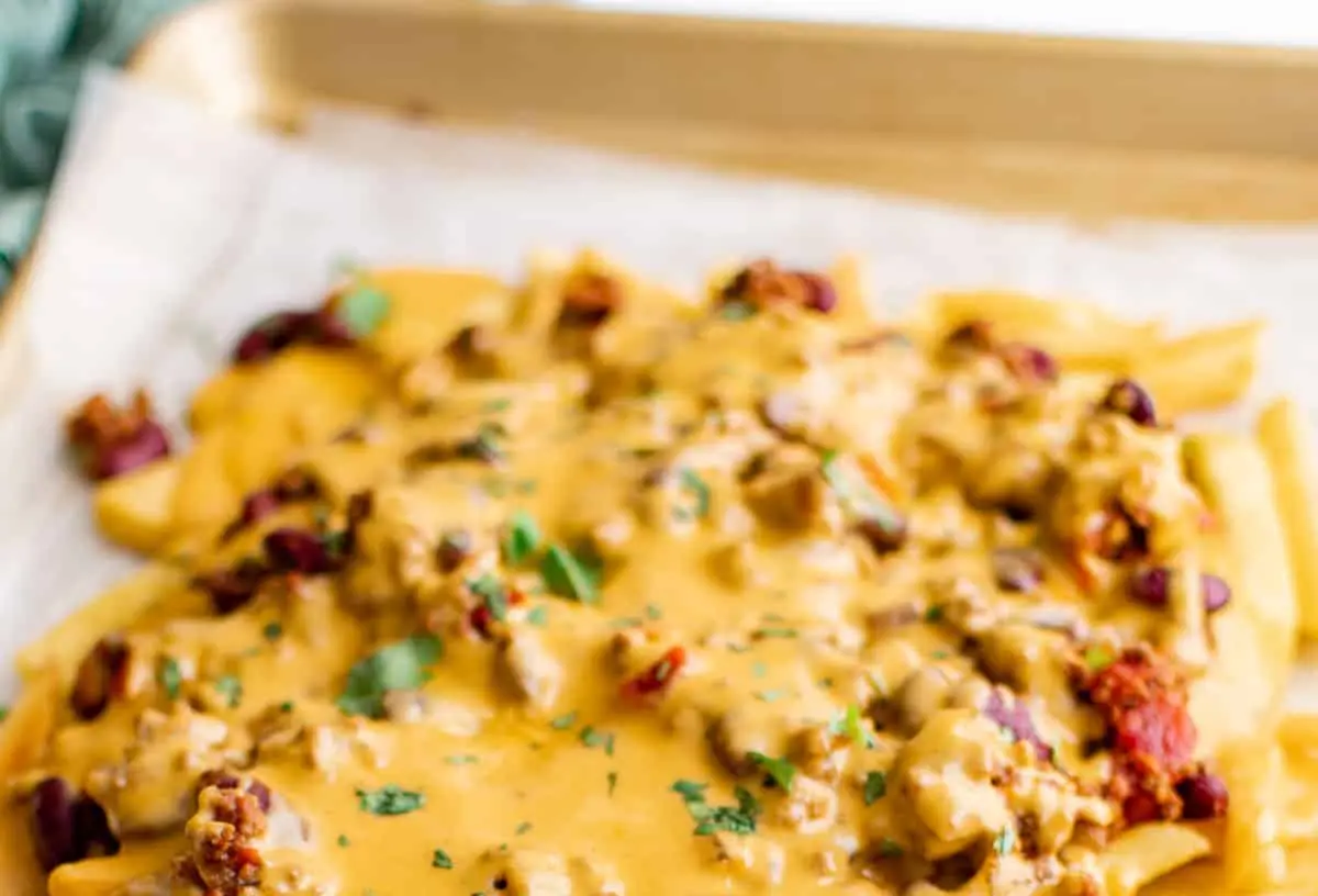 Chili Cheese Fries: 8 Reasons We Crave Them 2 A generous serving of crispy french fries generously topped with savory chili and melted cheese